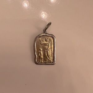 Waxing poetic Saint pendant!